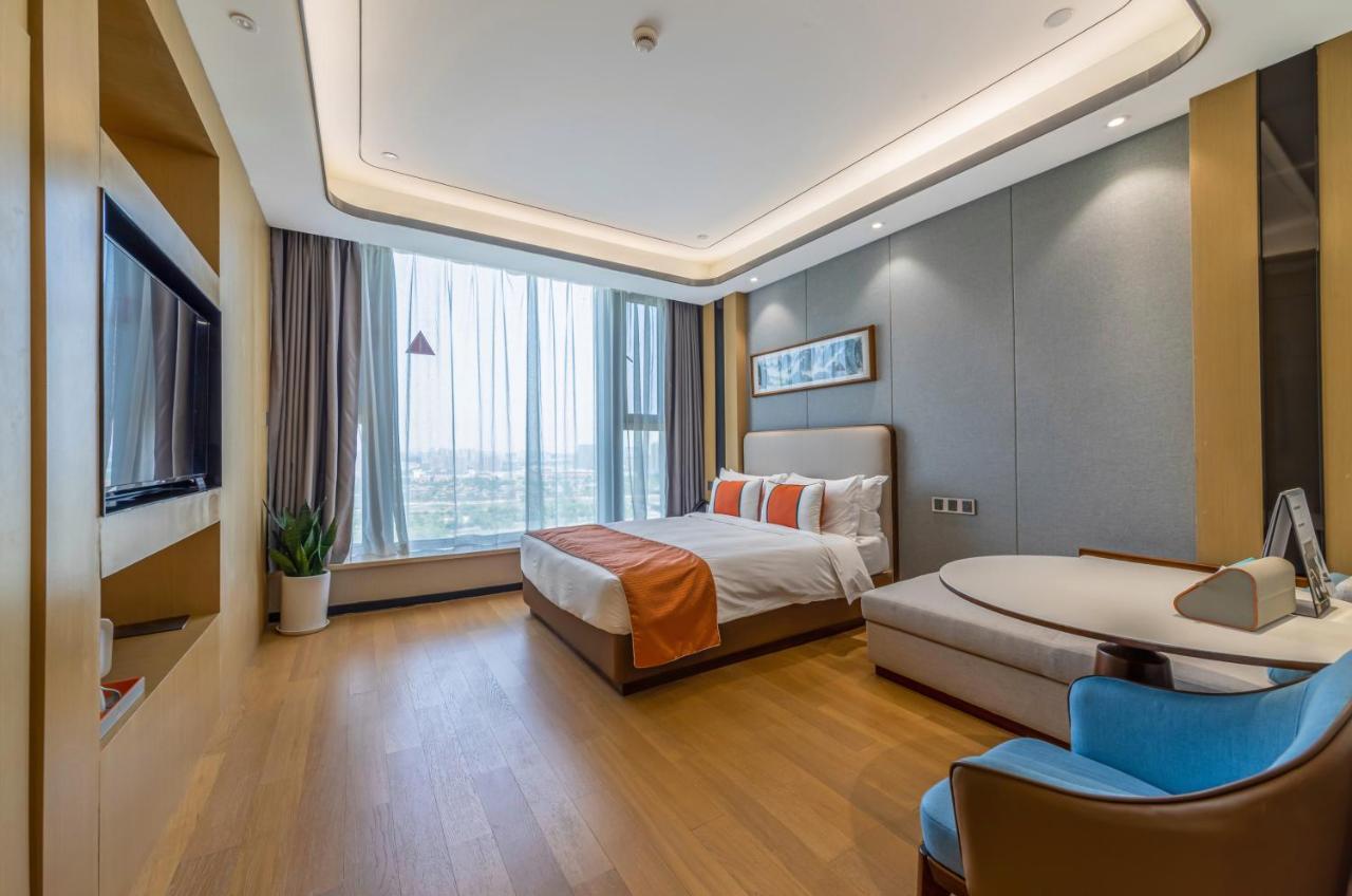 Jinling Funhome Hotel Nanjing Jiulong Lake - Nanjing South Railway Station Zewnętrze zdjęcie